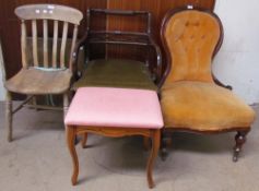 A Victorian mahogany framed nursing chair, with button back upholstery together with a Regency style