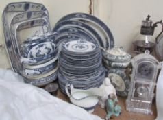 A Wood & Sons ''Warwick'' pattern blue and white part dinner service together with a crystal legends