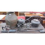A cast iron kettle together with a saucepan and lid, fire irons, flat irons, pewter mugs, bronze pot