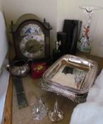 Two electroplated entree dishes and covers together with a mantle clock, glass jug etc