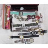 Twenty one assorted fashion watches including D&G, Eve Mon Crois etc