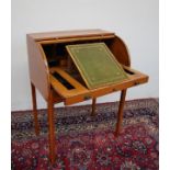 An Edwardian satinwood bureau with cylinder tambour and pull out writing surface fitted with drawers