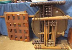 An Anglo Indian brass topped table with a folding stand together with another folding stand, a