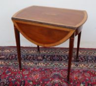 A George III mahogany and satinwood cross-banded Pembroke table of oval form, having an inlaid