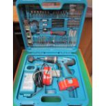 A Makita cordless drill, two batteries and accessories (sold as seen, untested)