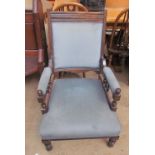 An Edwardian upholstered gentleman's library chair