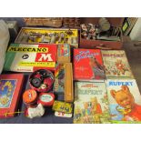 A Meccano set together with Meccano spares, Rupert books, lead figures, etc