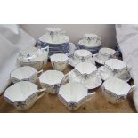 A Shelley porcelain part tea set, decorated with irises,