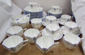 A Shelley porcelain part tea set, decorated with irises,