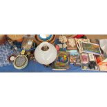 An extensive lot including a brass converted oil lamp, baskets, drinking glasses, pictures,