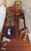 A Staffordshire pottery lion together with other model lions, portrait miniature etc