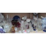 Assorted drinking glasses together with part tea sets, pottery clock, etc