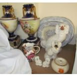 A pair of pottery vases together with blue and white pottery meat plates, Staffordshire type dogs,