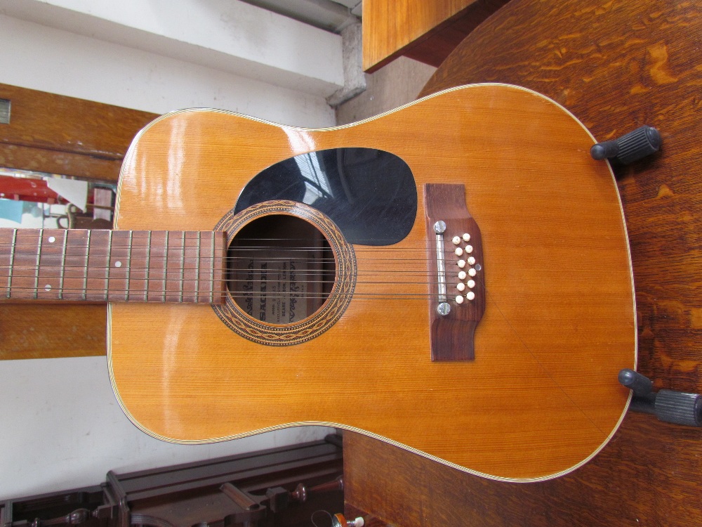 A Sagadia model 9204S twelve string acoustic guitar on a stand - Image 2 of 4