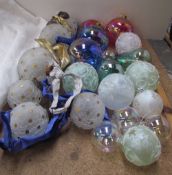 A collection of glass Christmas baubles