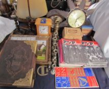 A leather bound copy of the Holy Bible together with POP Weekly magazines, mantle clocks, ships