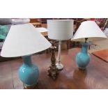 A pair of turquoise pottery baluster table lamps together with three other table lamps