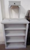 A pair of grey painted bookcases together with a similarly painted bedside table