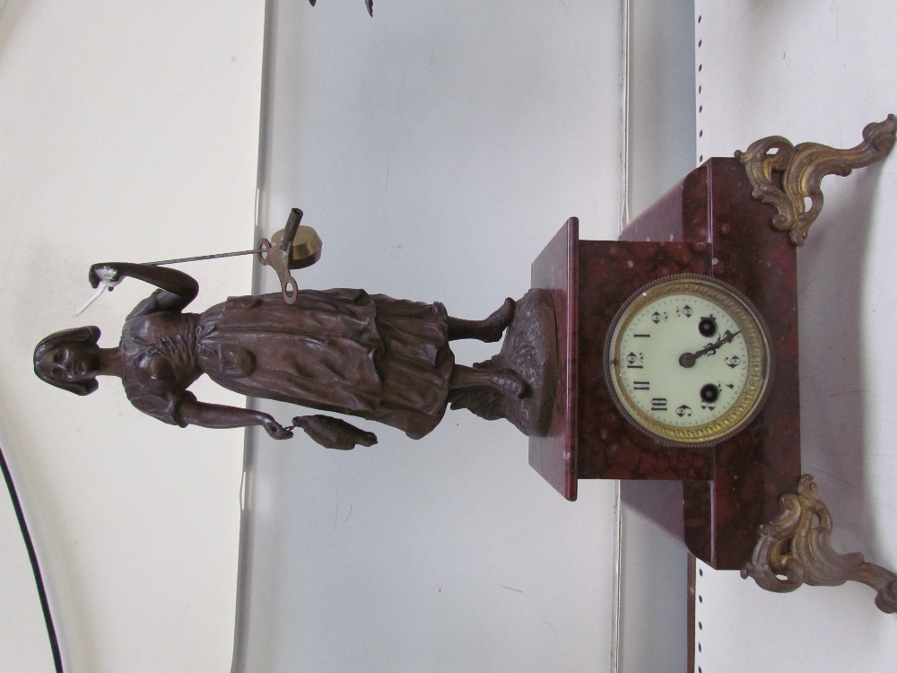 A clock garniture with a fisherwoman surmount, flanked by a pair of candelabra - Image 2 of 3