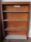 A 20th century oak bookcase with four shelves