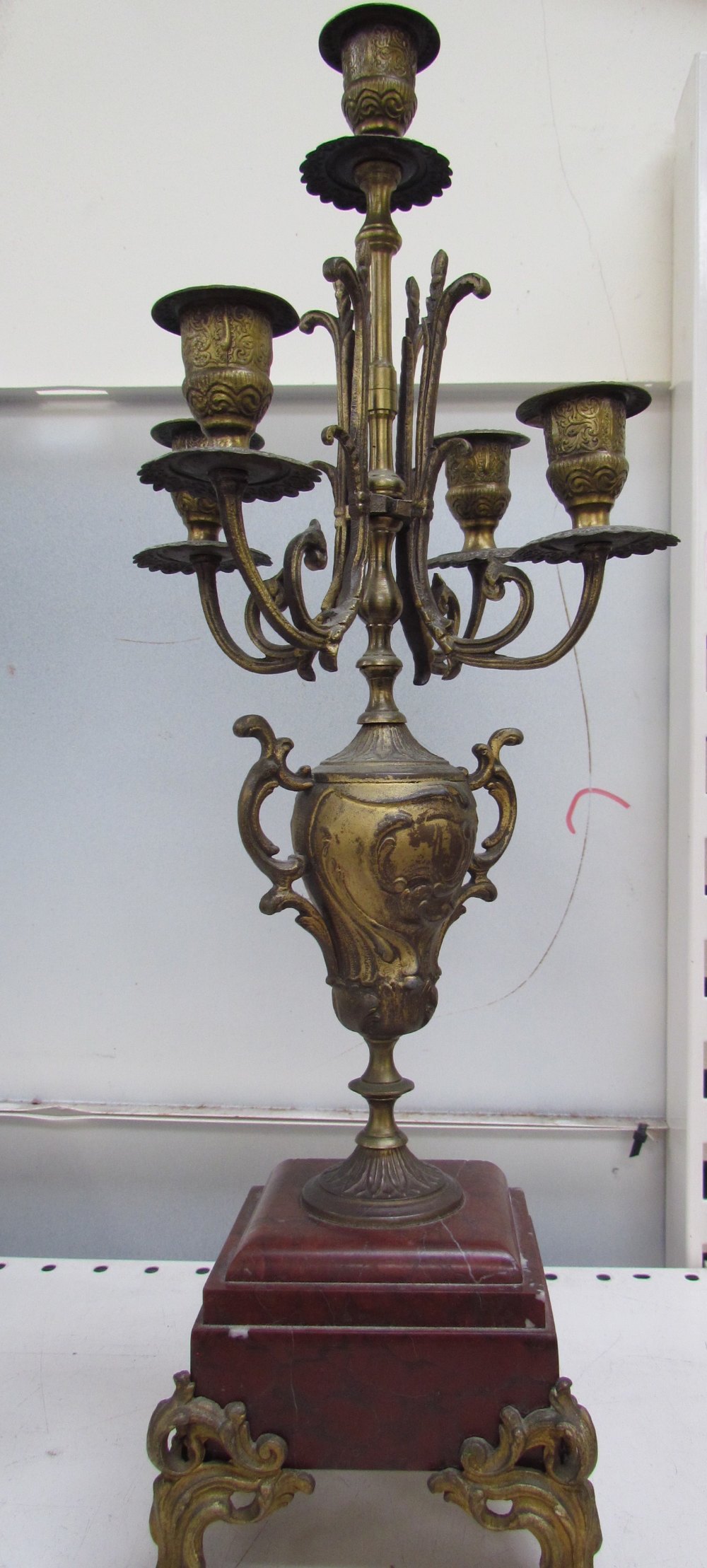 A clock garniture with a fisherwoman surmount, flanked by a pair of candelabra - Image 3 of 3