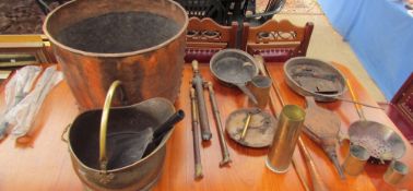 A large copper log basket together with a brass coal scuttle, copper sauce pans, bellows,