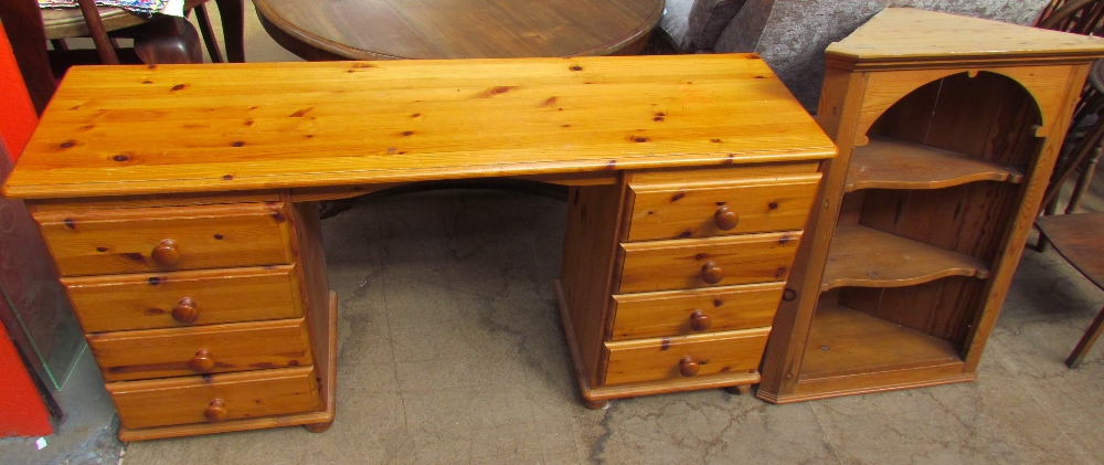 A pine dressing table together with a pine hanging corner cupboard