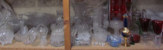 A large collection of Bohemian glass wares including vases, drinking glasses, bowls, dishes,