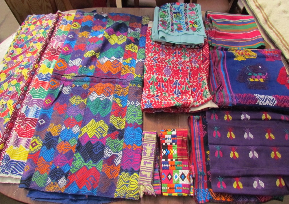 A large collection of Mexican fabrics including blankets, table coverings, cushion covers etc - Image 2 of 5