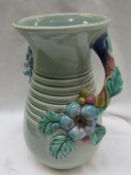 ***Unfortunately this lot has been withdrawn*** A Clarice Cliff moulded pottery vase