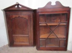 A 19th century oak hanging corner cupboard together with a mahogany glazed example