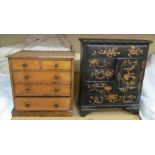 A Japanese lacquer table top cabinet with drawers decorated with flowerhead and leaves together with