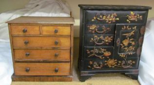 A Japanese lacquer table top cabinet with drawers decorated with flowerhead and leaves together with