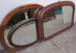 An Edwardian inlaid walnut overmantel mirror together with two other mirrors