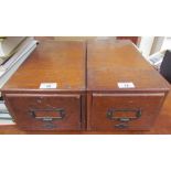 A pair of walnut record card filing cabinets
