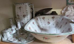 An Edwardian pottery jug and basin set comprising a jug and basin, dressing table set, together with