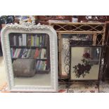 A cream overmantel mirror together with twelve other decorative wall mirrors and a fire screen