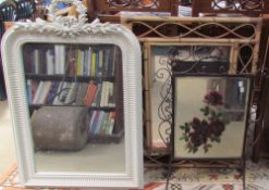 A cream overmantel mirror together with twelve other decorative wall mirrors and a fire screen