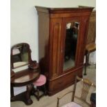 A Victorian mahogany wardrobe together with a Victorian Duchess dressing table and a stool