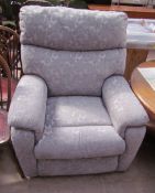 A Timotion TP2 reclining chair in a grey floral fabric