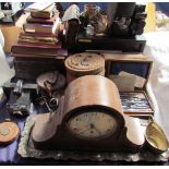 A walnut cased mantle clock together with books, polaroid camera, geometry set, epns etc