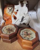 Two Staffordshire lions with glass eyes together with a Staffordshire figure group and four framed