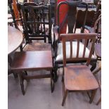 A Queen Anne style mahogany elbow chair together with a spindle back dining chair, a church chair