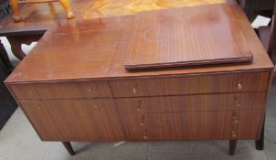 A 20th century mahogany side cabinet, with a turntable to the top,