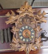 A Black forest cuckoo clock,