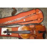 A Violin, with a two piece back and ebonised stringing, 59cm long overall,