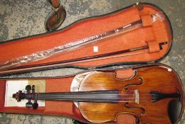 A Violin, with a two piece back and ebonised stringing, 59cm long overall,