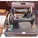 A Singer sewing machine cased,