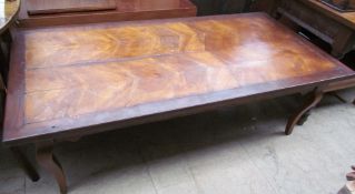 An Olive wood coffee table,