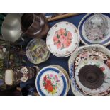 A collection of collectors plates together with a stoneware jug, a case of porcelain butterflies,